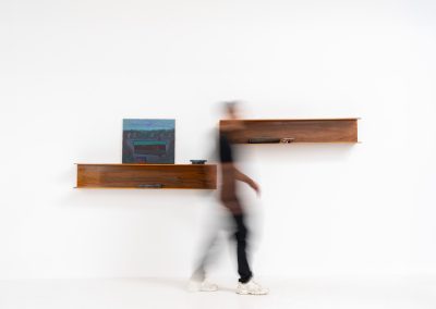 Set of 2 huge wall shelves by Walter Wirz for Wilhelm Renz (Germany, 1965). These iconic U-shaped wall shelves in teak are just stunning. They are sleek, timeless and absolutely beautiful. The shelves remain in very good and original condition. They are labeled.