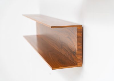 Set of 2 huge wall shelves by Walter Wirz for Wilhelm Renz (Germany, 1965). These iconic U-shaped wall shelves in teak are just stunning. They are sleek, timeless and absolutely beautiful. The shelves remain in very good and original condition. They are labeled.