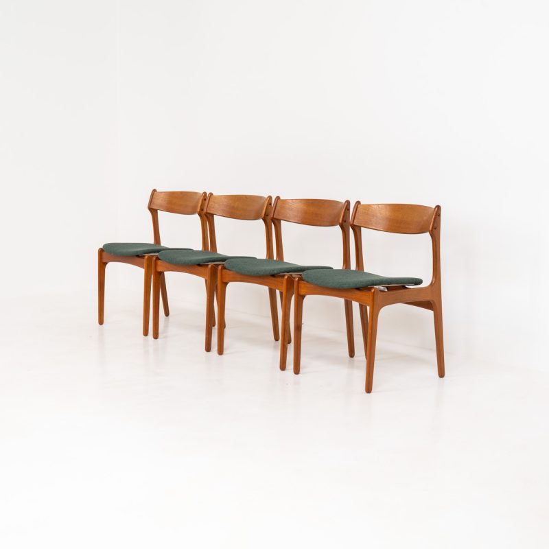 Set of 4 “Model 49” dining chairs by Erik Buch for O.D. Møbler (Denmark, 1954). A stunning, high-quality design featuring solid teak frames, a generously curved teak backrest, and signature floating seats, newly upholstered in a wonderful moss green fabric. The chairs remain in splendid condition! Marked by maker.