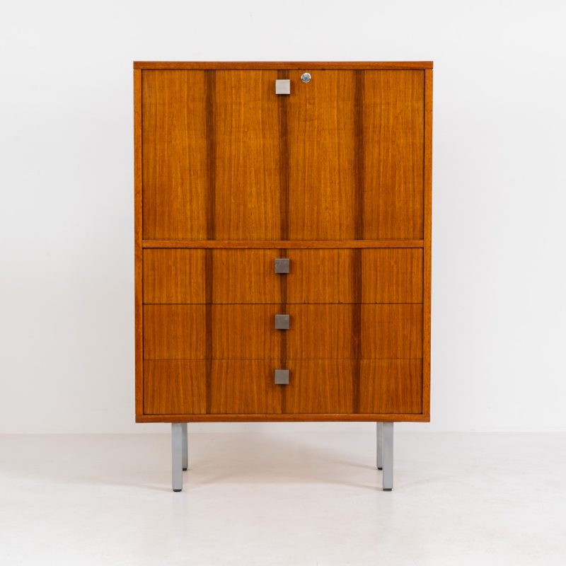 Rosewood desk by Alfred Hendrickx for Belform (Belgium, 1960s). Crafted out of Brazilian rosewood, this compact desk ticks a lot of boxes! It features a convenient drop-down leaf that is sturdy enough to work on, it has a wonderful woodgrain and three large drawers. It is elevated on slim metal legs, giving it a light and architectural appearance . The desk is in good vintage condition with some age related wear like small veneer chips on one of the drawers and light surface scratches, as shown on the pictures.