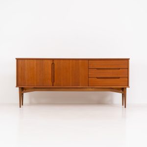 Stunning sideboard by Børge Mogensen for Fredericia (Denmark, 1960s). This piece is absolutely gorgeous! It’s made out of teak and is extremely detailed and built to very high quality standards. It features two doors, three drawers and the most beautiful inset handles. In excellent condition!