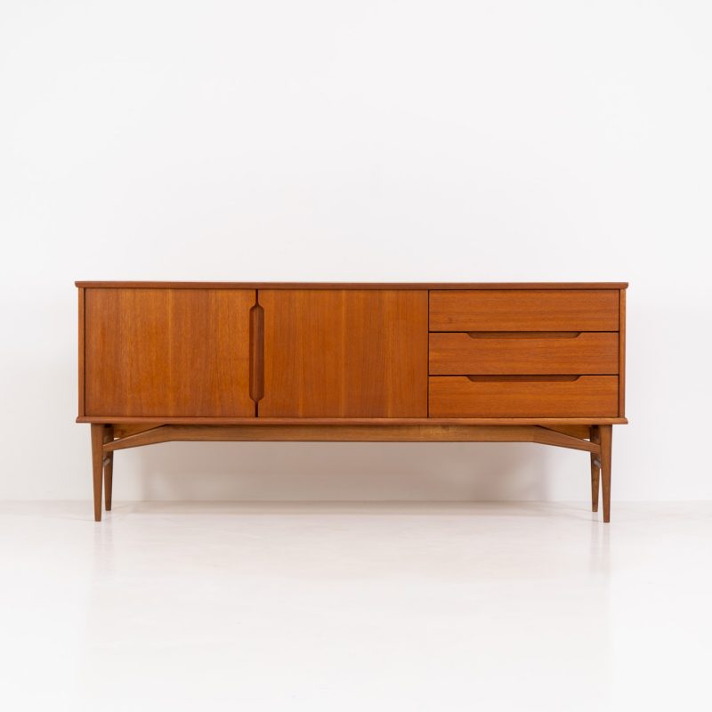Stunning sideboard by Børge Mogensen for Fredericia (Denmark, 1960s). This piece is absolutely gorgeous! It’s made out of teak and is extremely detailed and built to very high quality standards. It features two doors, three drawers and the most beautiful inset handles. In excellent condition!
