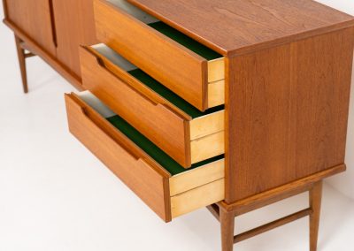 Stunning sideboard by Børge Mogensen for Fredericia (Denmark, 1960s). This piece is absolutely gorgeous! It’s made out of teak and is extremely detailed and built to very high quality standards. It features two doors, three drawers and the most beautiful inset handles. In excellent condition!