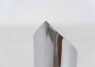 Space age ‘Flame’ table lamp in the manner of Goffredo Reggiani (Italy, 1970s). This piece is made out of chromed aluminium and has a beautiful spiraling shape which creates a stunning light glow. The lamp seamlessly blends form and function. It is in very good condition with some age related using traces.