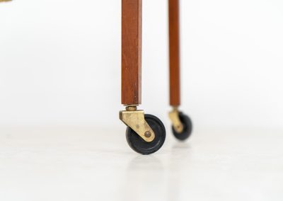 Teak sewing trolley / side table on castors (Denmark, 1960s). This little beauty features a drawer and a wicker basket that can be slid out. It’s in good condition.