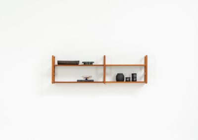 Stunning wall-shelve by Svend Dyrlund (Denmark, 1960s). This elegant wall-shelve, crafted in teak, features nice organic edges and provides the perfect combination of functionality and aesthetics. It is in splendid condition!