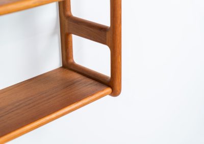 Stunning wall-shelve by Svend Dyrlund (Denmark, 1960s). This elegant wall-shelve, crafted in teak, features nice organic edges and provides the perfect combination of functionality and aesthetics. It is in splendid condition!