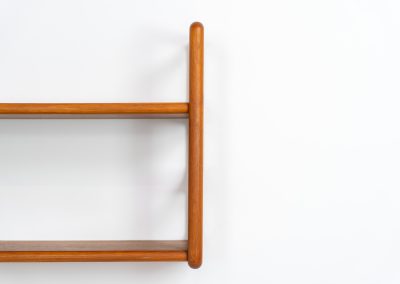 Stunning wall-shelve by Svend Dyrlund (Denmark, 1960s). This elegant wall-shelve, crafted in teak, features nice organic edges and provides the perfect combination of functionality and aesthetics. It is in splendid condition!