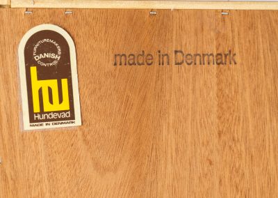 Midcentury bookcase by Poul Hundevad (Denmark, 1960s). A simple and well-built piece in teak designed by renowned Poul Hundevad. It contains six adjustable shelves with beveled and has an amazing natural woodgrain. In excellent condition and labeled by maker.