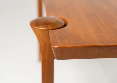 Stunning sculptural coffee table by Arne Vodder for Cado (Denmark, 1960s). A beautifully crafted coffee table made from solid teak, showcasing a stunning wood grain and an elegant, sculptural design. A timeless piece that embodies Danish modern design at its finest. It is labeled by the maker and remains in splendid condition!