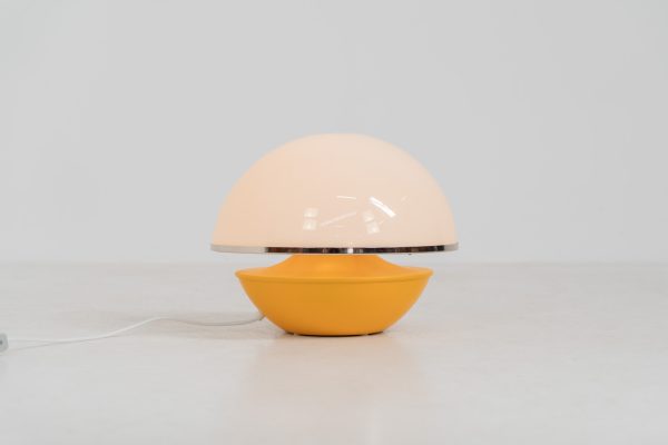 Unique mushroom table lamp (Italy, 1970s). We can’t find a designer on this beauty, but it is absolutely gorgeous! It features a yellow metal base and an acrylic mushroom shade. The lamp is newly rewired and in very good condition!