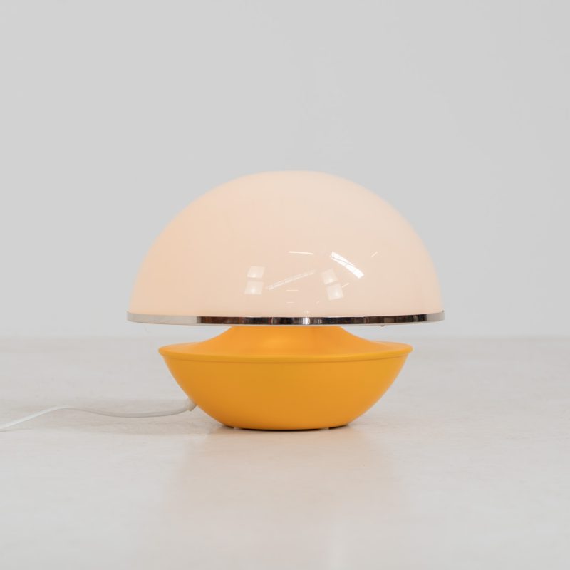 Unique mushroom table lamp (Italy, 1970s). We can’t find a designer on this beauty, but it is absolutely gorgeous! It features a yellow metal base and an acrylic mushroom shade. The lamp is newly rewired and in very good condition!