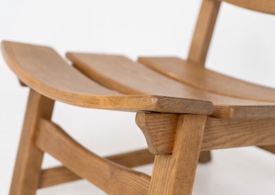 Brutalist lounge chair in solid oak by Dittmann & Co. for AWA Radboud (The Netherlands, 1960s). This robust fireplace chair, remeniscent of Pierre Chapo & Charlotte Perriand’s designs, is crafted out of solid oak and features a low comfortable seat and a vivid woodgrain. The chair is in a nice untouched vintage condition.