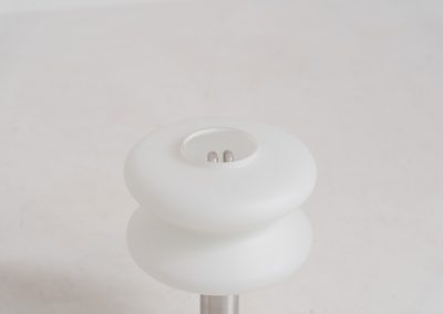 Modernist table lamp by AKA (Germany, 1960s). A beautiful table lamp with a heavy metal base, a brushed aluminium stem and and organically shaped, opal glass shade. The lamp is newly rewired and in very good condition!