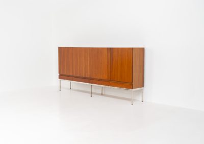 Iconic B60 sideboard in rosewood by Dieter Waeckerlin for Behr (Germany, 1950s). This highly sought after and significant “B60” sideboard is a masterful blend of minimalistic design and functional elegance. It’s unbelievable this piece was made in the 50’s and is yet so timeless. It contains four drawers and four doors with a minimal gap between them. The inside offers lots of storage space with adjustable shelves. It is in amazing condition with minimal sings of use and age.