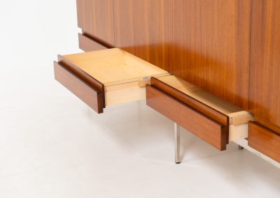 Iconic B60 sideboard in rosewood by Dieter Waeckerlin for Behr (Germany, 1950s). This highly sought after and significant “B60” sideboard is a masterful blend of minimalistic design and functional elegance. It’s unbelievable this piece was made in the 50’s and is yet so timeless. It contains four drawers and four doors with a minimal gap between them. The inside offers lots of storage space with adjustable shelves. It is in amazing condition with minimal sings of use and age.