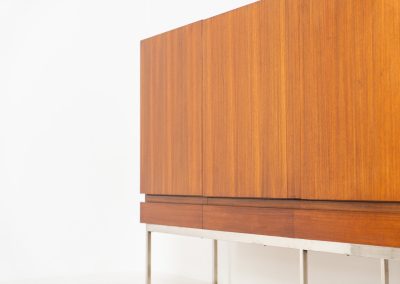 Iconic B60 sideboard in rosewood by Dieter Waeckerlin for Behr (Germany, 1950s). This highly sought after and significant “B60” sideboard is a masterful blend of minimalistic design and functional elegance. It’s unbelievable this piece was made in the 50’s and is yet so timeless. It contains four drawers and four doors with a minimal gap between them. The inside offers lots of storage space with adjustable shelves. It is in amazing condition with minimal sings of use and age.