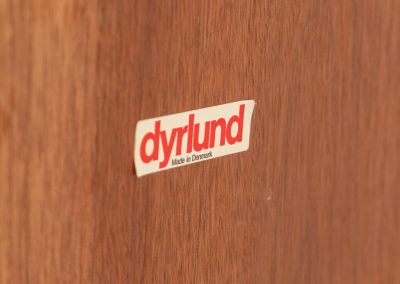 Beautiful bookcase in teak by Svend Dyrlund with tambour doors (Denmark, 1960s). This bookcase perfectly combines organic shapes and loads of details, like the tambour sliding doors, the beautiful handles or the bulky shelves, which are adjustable in height. It offers lots of storage space! In mint condition!