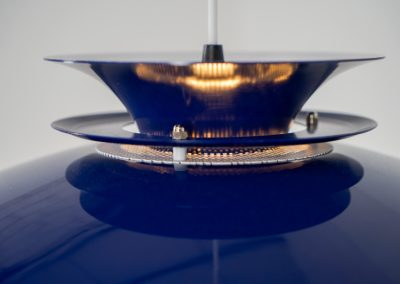 Elegant blue pendant light by Belux (Denmark, 1980s). A beautiful pendant light crafted out of aluminium shades, lacquered in a vivid blue color. The lamp is in very good condition and labeled by the manufacturer.