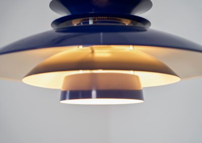 Elegant blue pendant light by Belux (Denmark, 1980s). A beautiful pendant light crafted out of aluminium shades, lacquered in a vivid blue color. The lamp is in very good condition and labeled by the manufacturer.