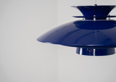 Elegant blue pendant light by Belux (Denmark, 1980s). A beautiful pendant light crafted out of aluminium shades, lacquered in a vivid blue color. The lamp is in very good condition and labeled by the manufacturer.