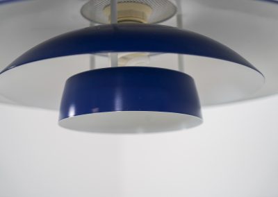 Elegant blue pendant light by Belux (Denmark, 1980s). A beautiful pendant light crafted out of aluminium shades, lacquered in a vivid blue color. The lamp is in very good condition and labeled by the manufacturer.