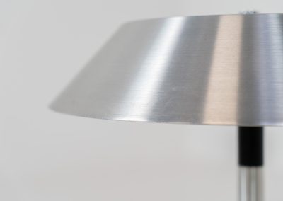 A “President” table lamp by Jo Hammerborg for Fog & Mørup (Denmark, 1960s). A stunning design classic and one of Hammerborg’s most renowned pieces. This President table lamp, made out of brushed aluminium, black lacquered wood and chromed steel is a perfect example of contemporary Danish modernism! The lamp is fully functional and in very good vintage condition, showing only minor signs of use.