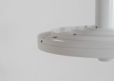 “Fibonacci” pendant light by Sophus Frandsen for Fog & Mørup (Denmark, 1960s). The Fibonacci lamp uses a gravity-guided sliding dip mechanism: the shade glides along the rail and naturally ‘dips’ into position, allowing effortless adjustment of light direction and intensity, a hallmark of Sophus Frandsen’s engineering-minded approach to lighting. The lamp is in amazing vintage condition with minor age related marks. Marked by maker.