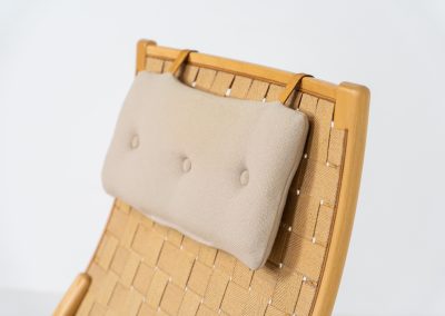 Albert chair by Finn Ostergaard for Skipper (Denmark, 1970s). A beautiful and sculptural armchair that consists of a beech bentwood frame, a woven canvas-strap webbing and an adjustable canvas headrest, finished with leather details. In good condition with a nice patina on the straps & canvas.