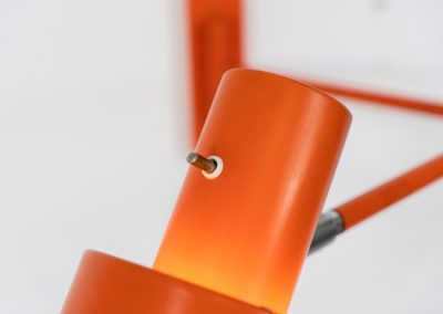 Orange “Skala” wall lamp by Jo Hammerborg for Fog & Mørup (Denmark, 1960s). An beautiful example of Scandinavian modernism, offering versatile lighting options thanks to its three pivoting points that allow you to adjust its position to suit your needs perfectly. The orange version of this piece is rarely seen, and a true eye catcher. The lamp is in good vintage condition with some visible using traces and small scuffs in the lacquer, as shown on the pictures.