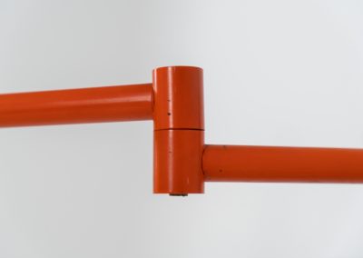 Orange “Skala” wall lamp by Jo Hammerborg for Fog & Mørup (Denmark, 1960s). An beautiful example of Scandinavian modernism, offering versatile lighting options thanks to its three pivoting points that allow you to adjust its position to suit your needs perfectly. The orange version of this piece is rarely seen, and a true eye catcher. The lamp is in good vintage condition with some visible using traces and small scuffs in the lacquer, as shown on the pictures.