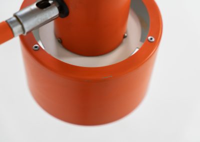 Orange “Skala” wall lamp by Jo Hammerborg for Fog & Mørup (Denmark, 1960s). An beautiful example of Scandinavian modernism, offering versatile lighting options thanks to its three pivoting points that allow you to adjust its position to suit your needs perfectly. The orange version of this piece is rarely seen, and a true eye catcher. The lamp is in good vintage condition with some visible using traces and small scuffs in the lacquer, as shown on the pictures.