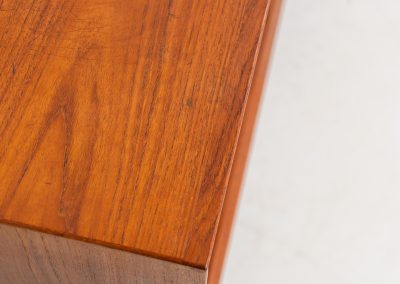 Rare “OS29” sideboard by Arne Vodder for Sibast (Denmark, 1950s). This highly important and collectible masterpiece by Arne Vodder is a rarity to find in good condition. The OS29 has perfect proportions, beautiful aesthetics and a high quality finish. It is crafted out of teak and features a turnable black door, 5 bow tie shaped drawers, adjustable shelves and a raised back edge. This piece remains in very good condition with a few small repair marks and using traces, as shown on the pictures. It is marked and stamped by the maker.