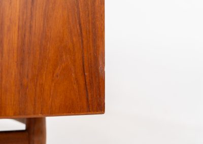 Rare “OS29” sideboard by Arne Vodder for Sibast (Denmark, 1950s). This highly important and collectible masterpiece by Arne Vodder is a rarity to find in good condition. The OS29 has perfect proportions, beautiful aesthetics and a high quality finish. It is crafted out of teak and features a turnable black door, 5 bow tie shaped drawers, adjustable shelves and a raised back edge. This piece remains in very good condition with a few small repair marks and using traces, as shown on the pictures. It is marked and stamped by the maker.