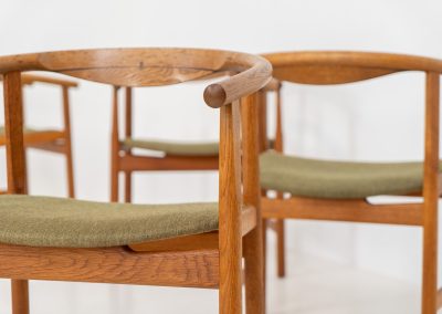 Set of 4 “PP203” arm chairs by Hans J. Wegner for PP Møbler (Denmark, 1960s). The PP203 chair, also called “First Chair” is an iconic design by the renowned Hans Wegner and is crafted out of solid oak and highly detailed wengé joinery. These beauties are in very good condition, have the original green upholstery and are marked by maker.