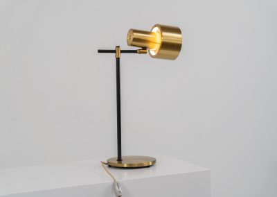 A rare brass “Lento” table lamp by Jo Hammerborg for Fog & Mørup (Denmark, 1960s). An iconic example of Scandinavian modernism! Jo Hammerborg's Lento table lamp series was launched by Fog & Mørup in the mid-1960s in three versions – aluminium, brass and copper. This example is the very hard to find solid brass edition and is in very good condition with some surface scratches and a nice patina.