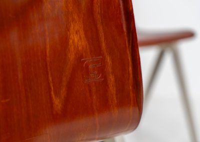 Set of 6 “S22” industrial dining chairs by Elmar Flototto for Pagholz (Germany, 1960s). This set of six original S22 industrial dining chairs, designed by Elmar Flötotto for Pagholz, dates from the 1960s and was produced in Germany. The chairs feature a rare and highly sought-after combination of rosewood-toned moulded Pagholz seats paired with crème powder-coated steel frames. Their clean, functional design reflects the strong industrial aesthetic Pagholz is known for. All chairs are fully stackable and come with the original stacking trolley, a seldom-found and highly desirable addition. The set is in very good vintage condition, showing only minor signs of wear consistent with age and use, without structural issues. A timeless and characterful set, suitable for both dining and contract interiors, and a strong example of post-war German industrial design.