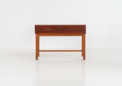 Teak hallway cabinet (Denmark, 1960s). An elegant hallway cabinet in teak, supported by oak legs. Its in good vintage condition with some age related wear.