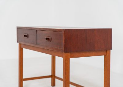 Teak hallway cabinet (Denmark, 1960s). An elegant hallway cabinet in teak, supported by oak legs. Its in good vintage condition with some age related wear.