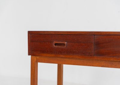 Teak hallway cabinet (Denmark, 1960s). An elegant hallway cabinet in teak, supported by oak legs. Its in good vintage condition with some age related wear.