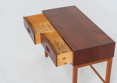 Teak hallway cabinet (Denmark, 1960s). An elegant hallway cabinet in teak, supported by oak legs. Its in good vintage condition with some age related wear.