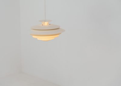 Beautiful “52580” pendant light by Form Light (Denmark, 1970s). The lamp is crafted out of seven metal shades and gives a stunning light dispersion. In mint condition and labeled by maker.