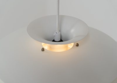 Beautiful “52580” pendant light by Form Light (Denmark, 1970s). The lamp is crafted out of seven metal shades and gives a stunning light dispersion. In mint condition and labeled by maker.