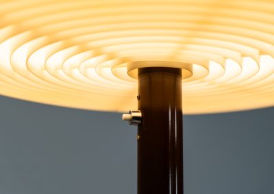 Rare “Knubbling” floor lamp by Anders Pehrson for Ateljé Lyktan (Sweden, 1970s). An absolutely spectacular design by renowned Swedish designer Anders Person, the Knubbling floor lamp is a true statement piece. The lamp features an elegant dark brown lacquered metal base, beautifully contrasted by a generous acrylic shade. Both the shade and the internal diffuser emit light in subtly different tones, creating a layered and dynamic illumination effect. When lit, the lamp reveals a warm, atmospheric glow with remarkable depth. This example remains in very good vintage condition, showing only minor surface scratches to the base consistent with age and use. A rare and collectible piece of Swedish modern lighting.