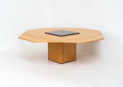 “Cirkante” dining table by Bob & Dries Vanden Berghe for Vanden Berghe Pauvers (Belgium, 1980s). This Belgian icon by Bob Van den Berghe is a masterclass in geometric functionalism. With its signature folding leaves, the Cirkante transforms from a solid square into a spacious octagon, expanding capacity from 8 to 12 people in seconds. By erasing the "head of the table" to put every guest at the center of the conversation. By removing the "head" of the table, its architectural form ensures every guest is at the heart of the conversation. Crafted from premium materials, it remains a timeless sculptural centerpiece for the modern collector. The table remains in amazing condition with minimal wear.