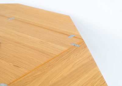 “Cirkante” dining table by Bob & Dries Vanden Berghe for Vanden Berghe Pauvers (Belgium, 1980s). This Belgian icon by Bob Van den Berghe is a masterclass in geometric functionalism. With its signature folding leaves, the Cirkante transforms from a solid square into a spacious octagon, expanding capacity from 8 to 12 people in seconds. By erasing the "head of the table" to put every guest at the center of the conversation. By removing the "head" of the table, its architectural form ensures every guest is at the heart of the conversation. Crafted from premium materials, it remains a timeless sculptural centerpiece for the modern collector. The table remains in amazing condition with minimal wear.