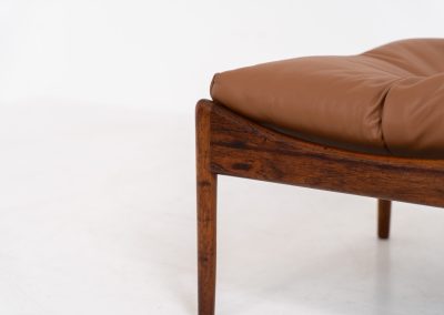 “Modus” stool by Kristian Vedel for Søren Willadsen in rosewood (Denmark, 1960s). This exceptional piece featured an elegant solid rosewood frame and the original cushion, newly upholstered in cognac leather. In very good condition with a nice patina on the wood. Marked by maker.