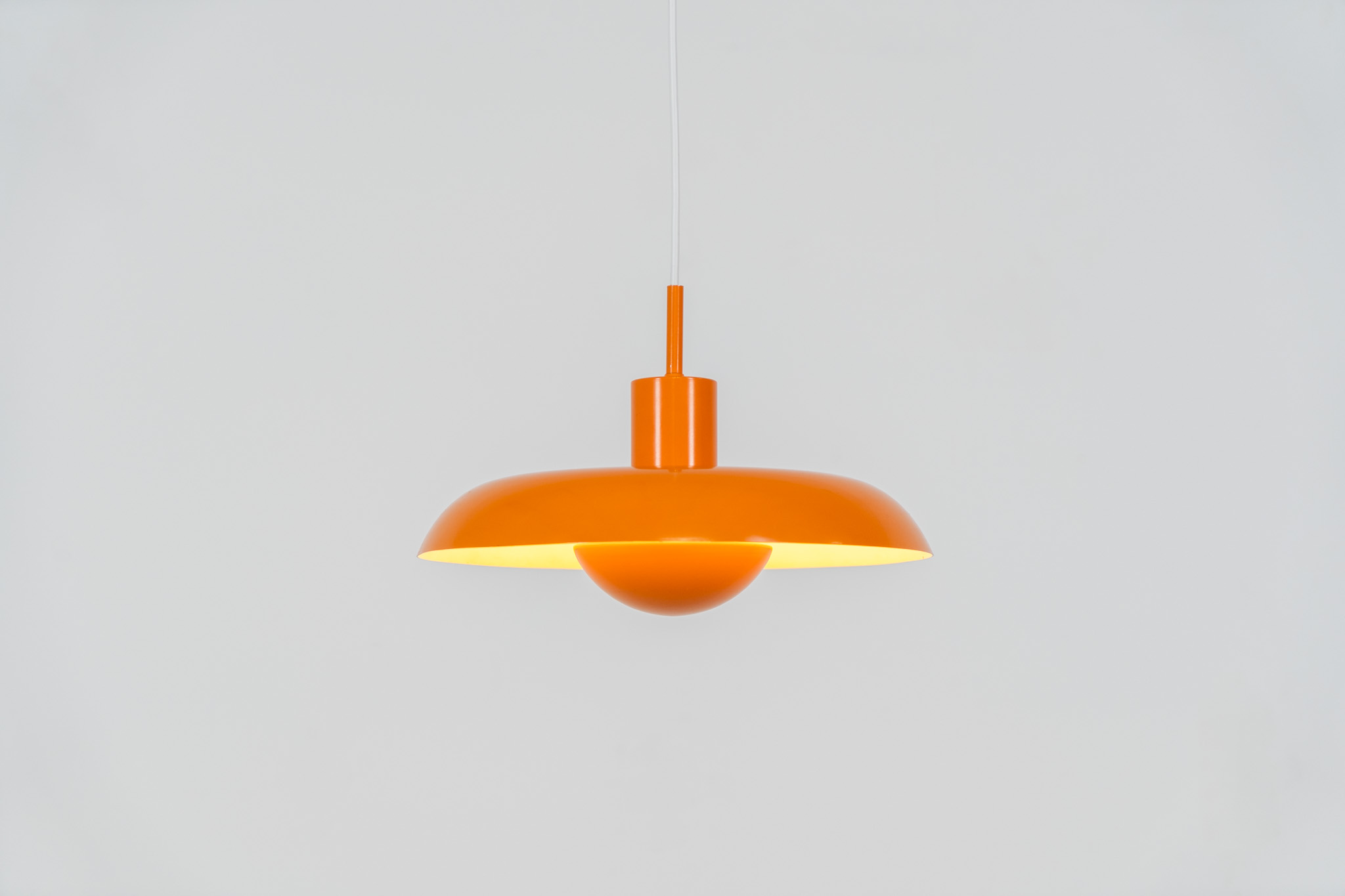 Iconic RA-24 pendant light by Piet Hein for Lyfa (Denmark, 1960s). Originally conceived in the early 1930s by Danish designer and poet Piet Hein, the RA lamp was ahead of its time. Due to the outbreak of the Second World War, the design never entered full-scale production back then. It wasn't until 1969 that LYFA finally brought the lamp into proper production. This example is in excellent condition, very close to mint. The original LYFA label is stamped into the suspension rod.