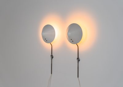 Stunning pair of “VIP” wall lights by Jørgen Gammelgaard for Pandul (Denmark, 1980s). These sleek wall lights are highly adjustable, both in height, angle and shade position. They are in very good condition, and marked by maker.