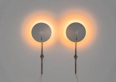 Stunning pair of “VIP” wall lights by Jørgen Gammelgaard for Pandul (Denmark, 1980s). These sleek wall lights are highly adjustable, both in height, angle and shade position. They are in very good condition, and marked by maker.